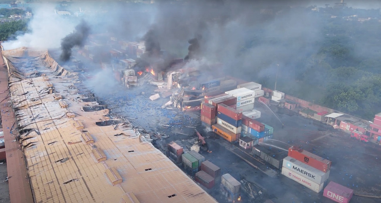 Smoke rises from the spot after a massive fire broke out in an inland container depot at Sitakunda, near the port city Chittagong