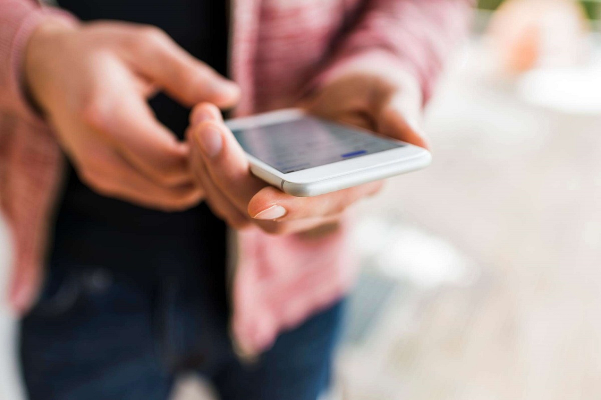 A man holding a mobile phone